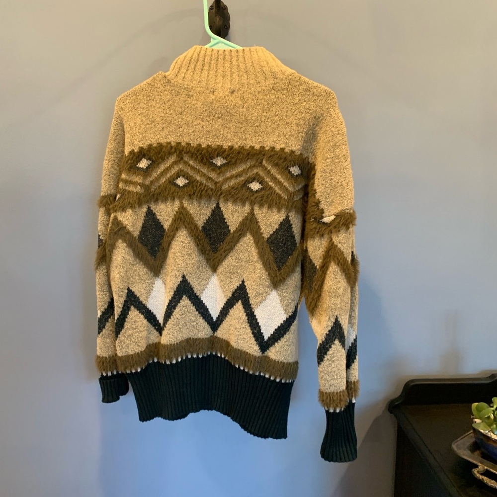 Warm pullover sweater with high neck